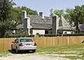 Maison Bolduc, in Ste. Genevieve, Missouri is a grander building in the same style as the Maison Bequette-Ribault.