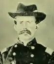 Old picture of an American Civil War officer with mustache and hat