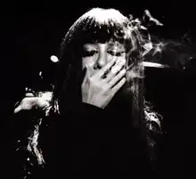 Maki Asakawa on the cover of her album Darkness IV in 2007.