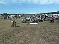 Spectators and competitors relax between the shooting.