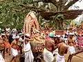 Malarāya Daiva on white boar chariot