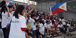 Supporters of the Philippine national team with flags