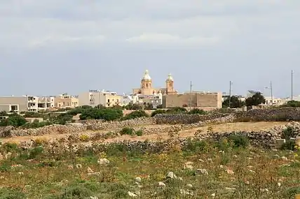 The church's dome and belfries, which dominate the Dingli skyline