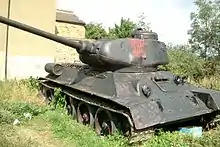 The tank in its original military olive drab colour
