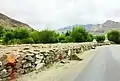 Mani wall along driveway to Hemis Monastery