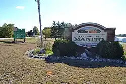 Manito sign on north side of town