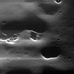 Mansur crater has hollows.  Mansur has the type morphology of a Mansurian crater.
