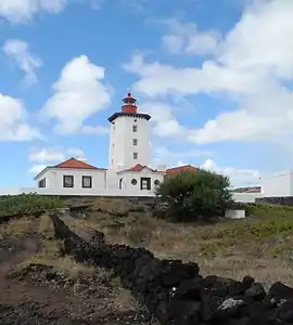 Facing into the eastern coast, the lighthouse of Manhenha is the last building in Ponta da Ilha, in the parish of Piedade