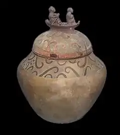 Manunggul Jar, dated 890-710 BCE, is an early burial jar in the Philippines with scroll designs