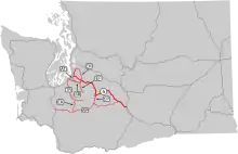 A grey map of Washington state with dark grey lines representing U.S. routes and a thick red line for PSH 5 and thin red lines for branches of PSH 5.