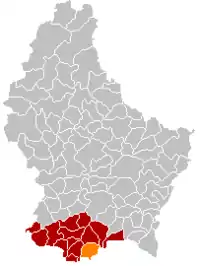 Map of Luxembourg with Dudelange highlighted in orange, and the canton in dark red