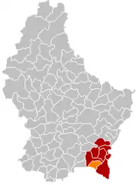 Map of Luxembourg with Mondorf-les-Bains highlighted in orange, and the canton in dark red