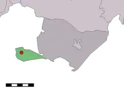 Location within Baarle-Nassau municipality of Castelré village (red dot) and statistical district (light green area)