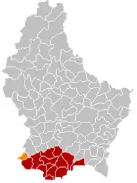 Map of Luxembourg with Pétange highlighted in orange, and the canton in dark red