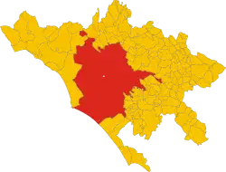 The territory of the comune (Roma Capitale, in red) inside the Metropolitan City of Rome (Città Metropolitana di Roma, in yellow). The white spot in the centre is Vatican City.