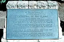 Plaque outside the church (1997)