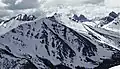 Marmot's north aspect centered, seen from The Whistlers.Peveril Peak is dark summit to right.