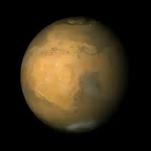 Mars Orbiter Camera view of Mars in enhanced color, centered on Arabia Terra (the bright area)