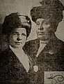 Diehl and Gillespie wearing their police badges, 1913