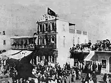 The Ottoman flag is raised during Mawlid an-Nabi celebration of Mohammad's day of birth in 1896 in the field of municipal Libyan city of Benghazi