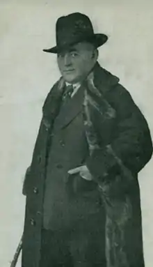 Photo of Max Malini wearing a heavy coat and hat