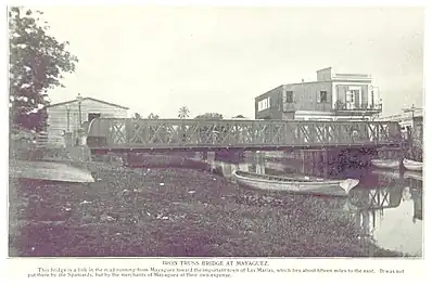 Iron truss bridge over the Yagüez River