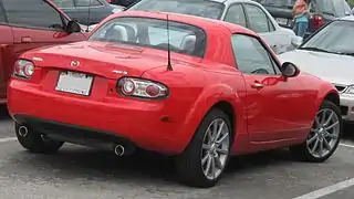 Mazda Miata Power Retractable Hard Top (PRHT) c. 2007, with 77 lb (35 kg) polycarbonate hardtop and identical cargo capacity to the soft top version