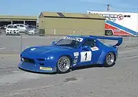 Bruce Banks placed seventh driving a Mazda RX-7
