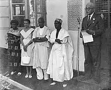 Dr. M. C. F. Easmon, standing on the right
