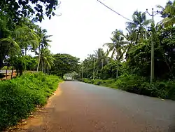 Paravur-Chathannoor road at Meenad