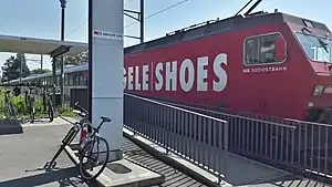 Red train at side platform