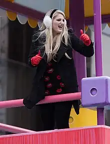 Meghan Trainor, a woman, smiling