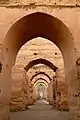 The arches of the granary in the Heri as-Swani