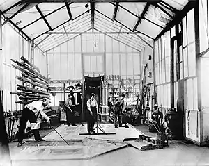 Image 39Georges Méliès (left) painting a backdrop in his studio (from History of film)