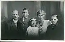 black and white photo of Melville, Gordon, Joan, Netta and Peter Birks