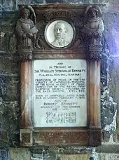 memorial plaque in white and rose marble, including two barsof music