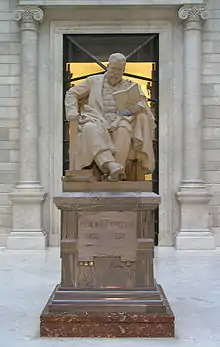 Statue of Marcelino Menéndez y Pelayo in the lobby of the B.N.E.