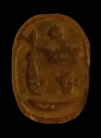 A scarab attributed to a king Menibre who, according to Kitchen, may have been Tefnakht II. Bologna, Museo Civico Archeologico, KS 2670.