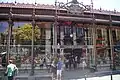 An exterior daylight view of the Mercado de San Miguel in Madrid
