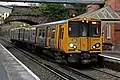 A Merseyrail Class 507 at the station