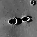 Photo taken by Lunar Reconnaissance Orbiter with low Sun, showing relief of ejecta.