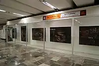 Picture of an art gallery displaying 4 paintings.