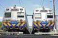 Two Hitachis in Metro Trains Melbourne livery, stabled near North Melbourne