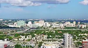 Miami's Health District with the Midtown Interchange (foreground) and Miami International Airport (background) in June 2010
