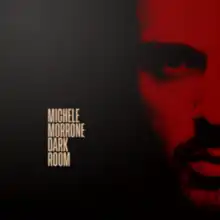 Black square with Michele Morrone face and the words "MICHELE MORRONE DARK ROOM".