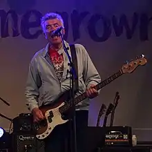 Bradley performing with The Undertones in Newcastle, County Down in 2022.