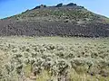 North slope with juniper above, and sagebrush in foreground