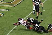 Mike Imoh diving for a touchdown against Wake Forest