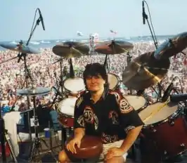 Drummer Mike Kowalski on stage at his drums during a Beach Boys concert in 1998
