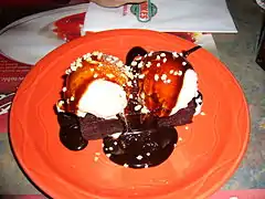 A Mikes-style brownie, with ice cream and heated chocolate sauce